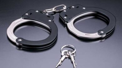 Hand Cuff Hyderabad Police Arrest Two Individuals for Online Cheating and Forgery