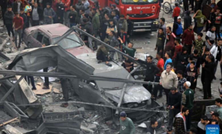 Iran revises death toll of twin blasts to 95