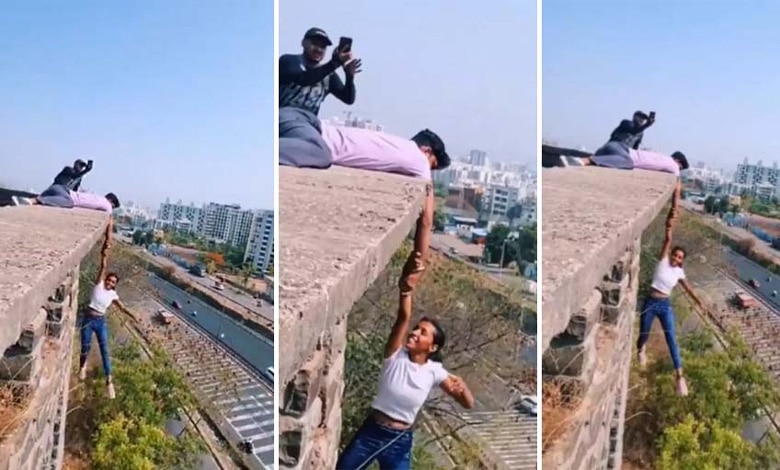 Girl dangles mid-air for reel, Pune Police nab 2 for daredevil stunt