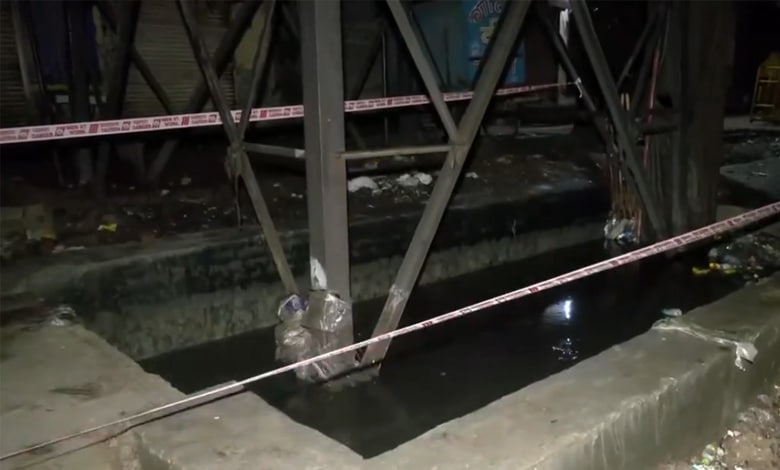 Woman, child die after falling into waterlogged drain