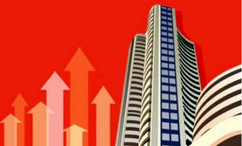 Sensex closes at record high; Adani Green soars 7.59 pc