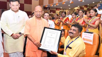 An unconventional tribute: Yogi Adityanath descends from dais to honour injured teacher