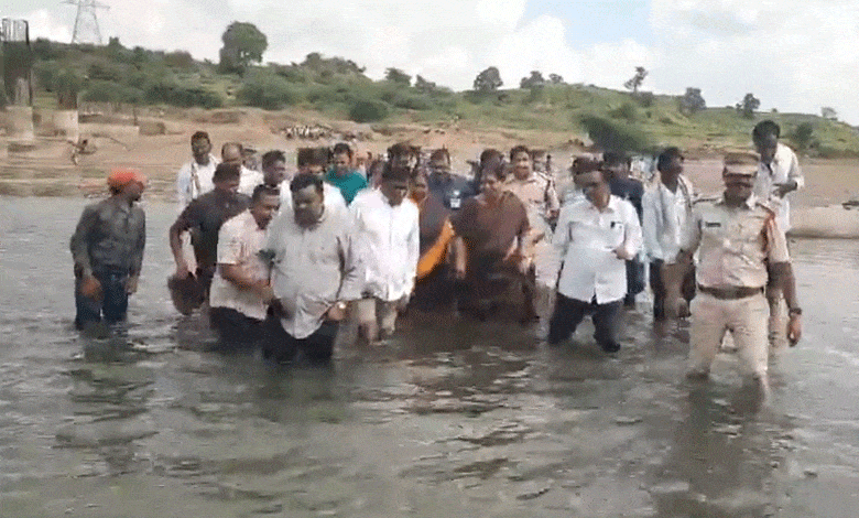 Minister Seethakka Crosses Stream for School Inauguration but Ignores Bridge Concerns