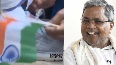 Disrespect to National Flag as Karnataka CM Siddaramaiah Holds It While Congress Worker Unties Shoelaces