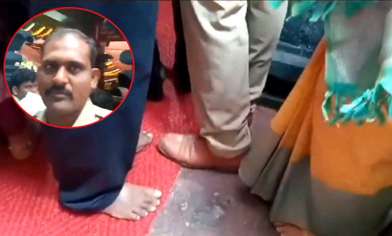 Police Officer Sparks Controversy by Wearing Boots Near Durga Temple Sanctum