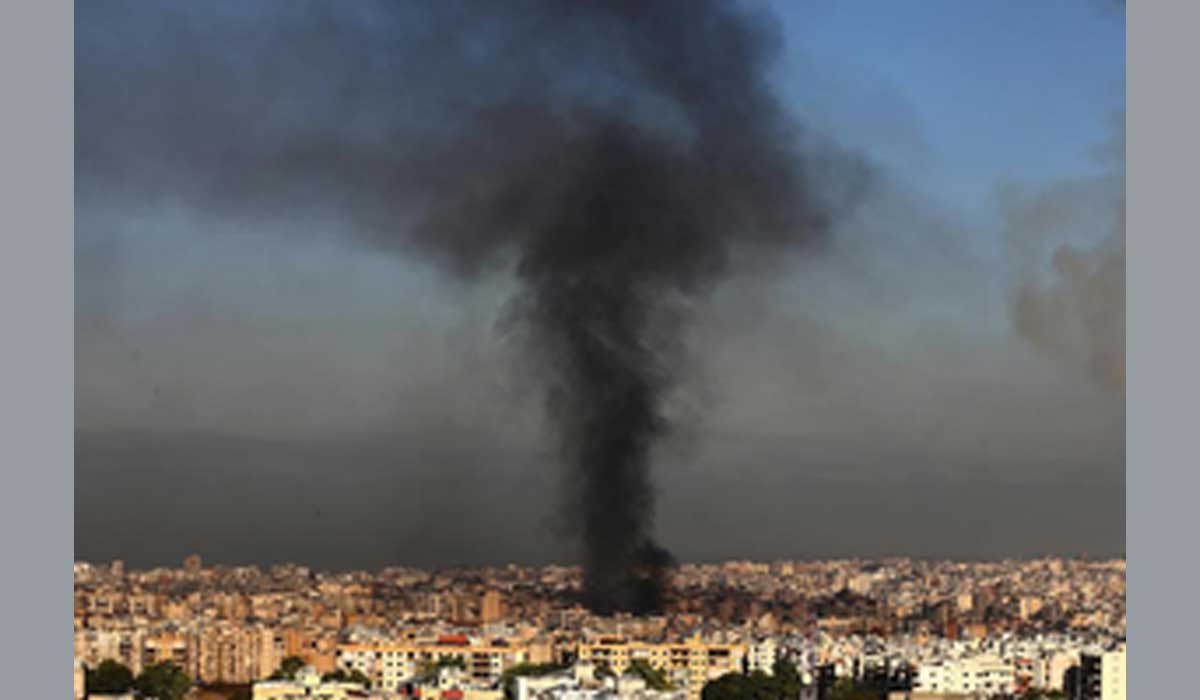 Hezbollah Media Chief Mohammad Afif Killed "The aftermath of the Israeli airstrike in Beirut, with rescue workers searching through the rubble near the destroyed Ba'ath Party office."