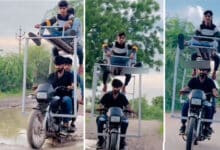 Risky Ride: Youths Perform Dangerous Stunts on Iron Hoop Bike!