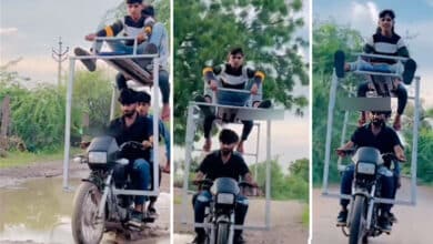 Risky Ride: Youths Perform Dangerous Stunts on Iron Hoop Bike!