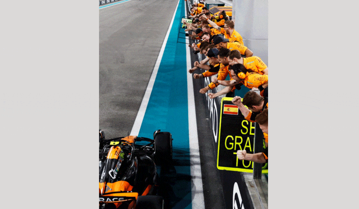 Lando Norris celebrates victory at the Abu Dhabi Grand Prix, securing McLaren’s first constructors’ championship since 1998.