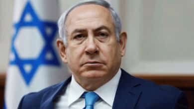 Israel's Netanyahu vows to challenge 'absurd' corruption charges as he takes stand in his trial