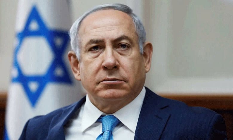 Israel's Netanyahu vows to challenge 'absurd' corruption charges as he takes stand in his trial