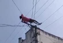 Drunk man climbs electric pole, lies down on wires in Andhra Pradesh